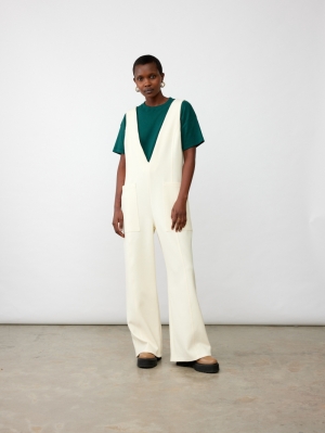 WIDE LEG OVERALL WITH DEEP V IVORY SUITING